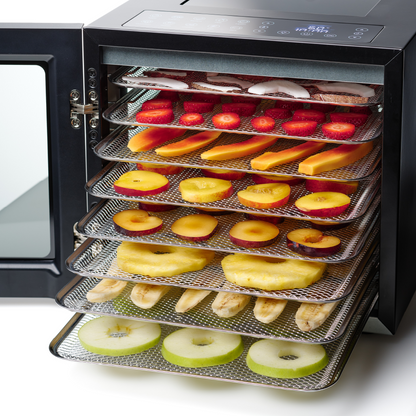 Open Solis VitaDry Food Dehydrator with sliced fruits on drying trays